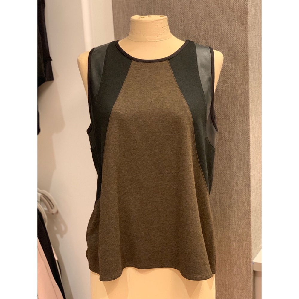 green shirt with black and faux leather detailing